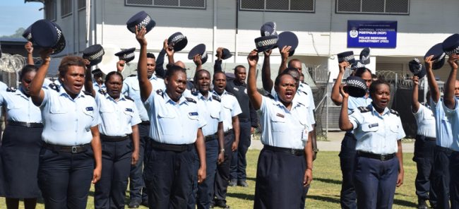 RSIPF Officers on parade give three happy cheers for the retirees