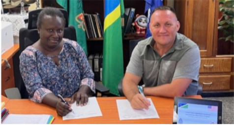 U.S. Army Lieutenant Colonel Aaron Solano and Permanent Secretary Karen Galokale sign the memorandum on September 4, 2024.