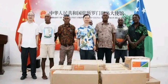 A group photo of Isabel delegation and Ambassador Cai Weiming during the handing over