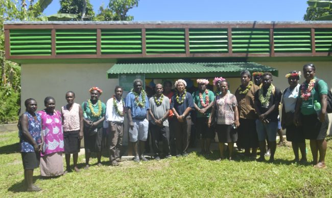 ADRA team, guests and Titiana School staffs pose for a group photo