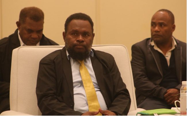 Elijah Asilaua (MPA), Premier for Malaita Province. (Seated at the back (l-r) are Mr. George Eric, Provincial Secretary for Malaita Provincial, and HCC