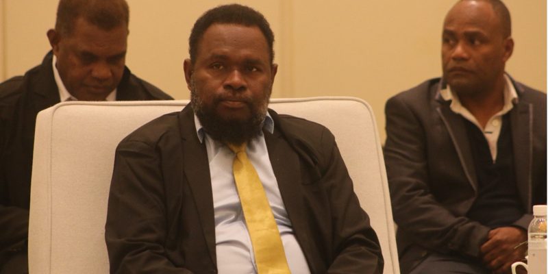 Elijah Asilaua (MPA), Premier for Malaita Province. (Seated at the back (l-r) are Mr. George Eric, Provincial Secretary for Malaita Provincial, and HCC