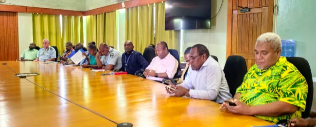 Government officers during the press conference
