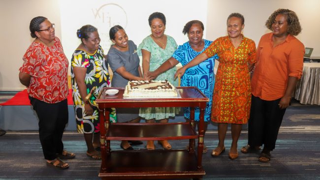Interim Board of the Women in Leadership Solomon Islands (WELSI) and representatives of the partner organisations cutting the cake to celebrate the official launch of WELSI