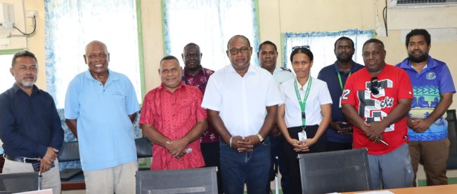 MID Minister Hon. Manasseh Maelanga (c) with members of the Board