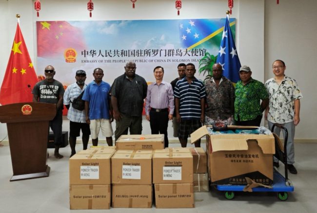 MP for Savo-Russells, Oliver Salopuka and Ambasador Cai Weiming (fourth and fifth from left) with a Chinese Embassy official and representatives from the recipient villages