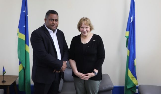 Minister and US envoy