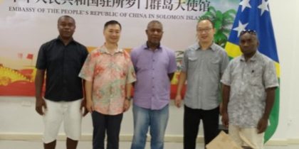 Officials witnessing the handing over of the donated items