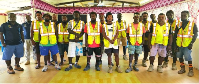 PMU ES Officer Mr Labere, Infrastructure Officer Jonathan Bisili, M&E officer Jimmy Kaluae and Super Construction site workers
