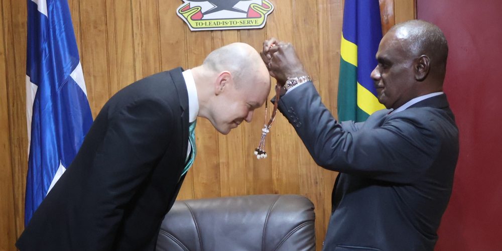 Prime Minister Hon. Manele presenting a gift to H.E Haapea, Finland’s Ambassador to Solomon Islands
