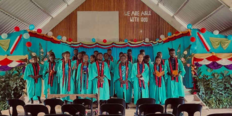 The graduating class singing a song. Photo Michael Koti