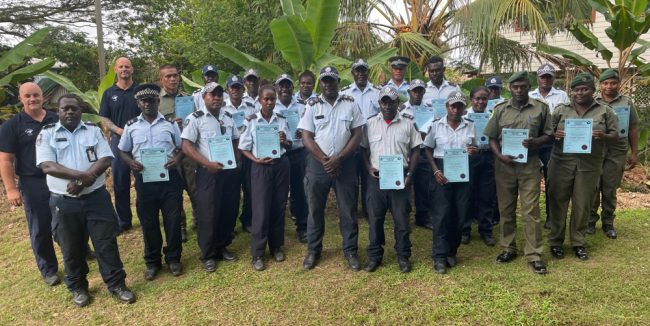 Group photo with certificates
