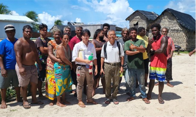 H.E Miwa with seaweed farmers