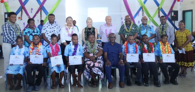 PM and Madam Manele, group photo with students, development partners and govt officials