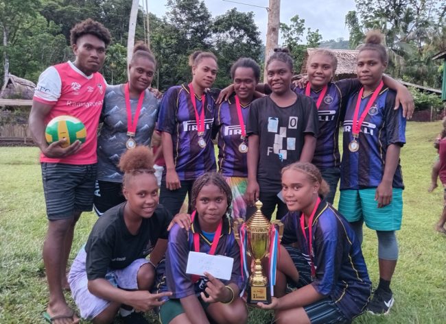 The Ladoa Black volleyball team proudly pose and display their winning trophy and prizes. Photo Lesley Sanga