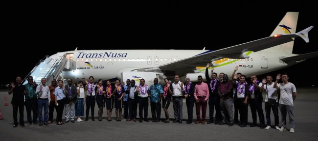 Government officials and guests welcoming the inaugral flight