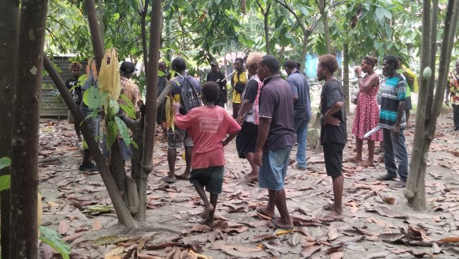 Participants listening to their trainer