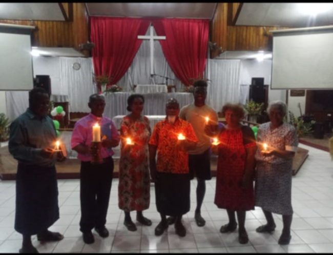 Worshipers at Wesley United Church on Christmas Eve, eagerly celebrating the birth of Jesus Christ