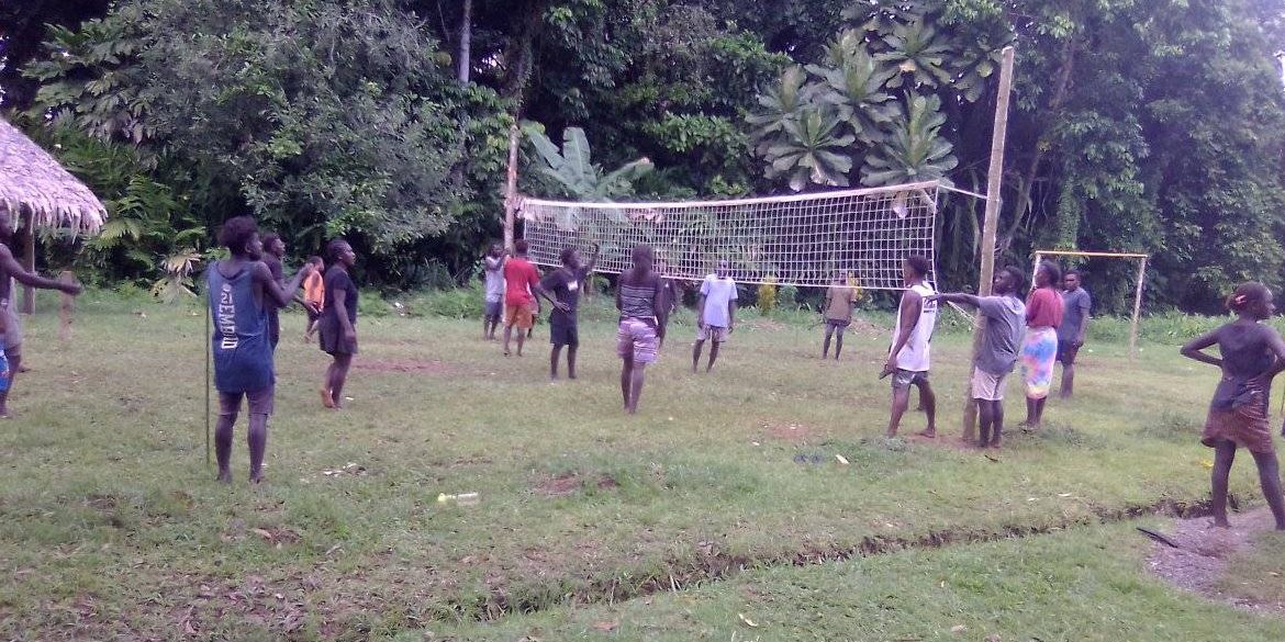 A game of volleyball during the new year at Koa