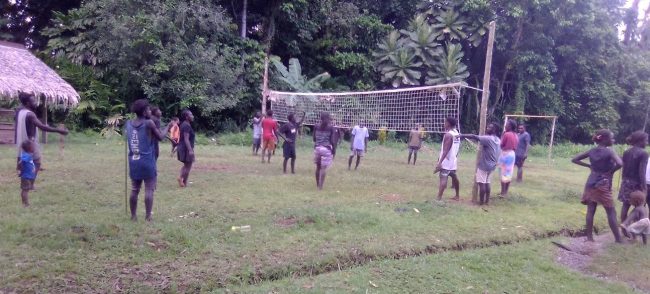 A game of volleyball during the new year at Koa