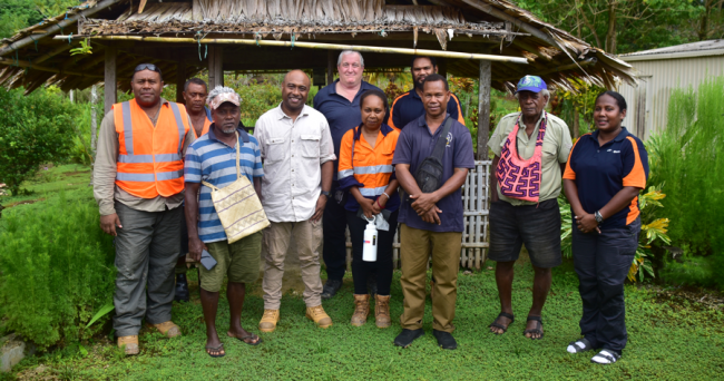 Community representatives and project stakeholders meet to discuss the Malu’u Market project