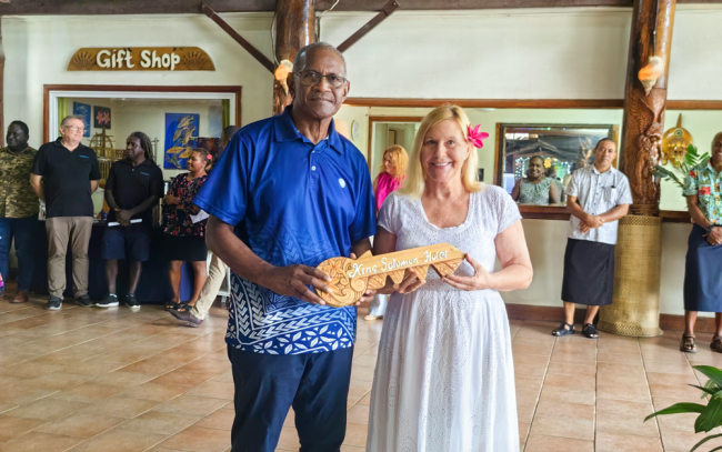 Handing over of the keys from the previous owner Susan Kennedy to Mike Wate CEO of SINPF