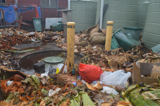 Heap of rubbish waste inside the rubbish section at the Gizo market
