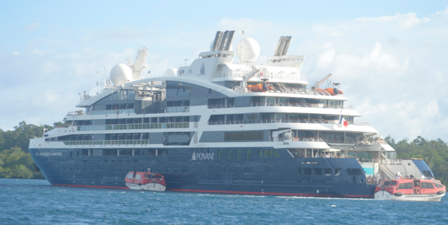 Le Jacques-Cartier (Ponant) anchoring in front of Loga island and Gizo township