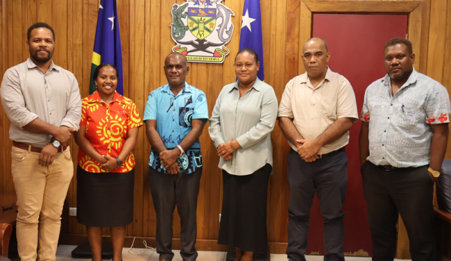 Prime Minister Hon. Manele and Secretary to Prime Minister Dr. Mataki group photo with SICCI board of directors and CEO.
