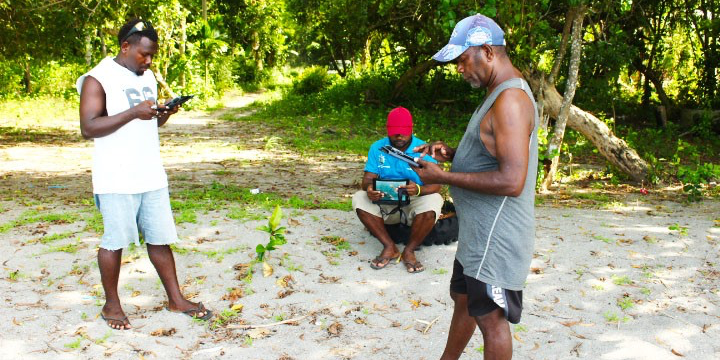 Team 4 Enumerators synching their questionaires to the NSO Headquarters.
