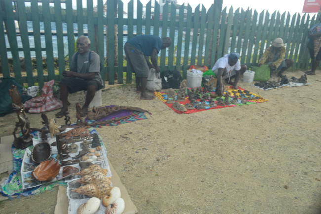Carvings displayed in front of Gizo Hotel