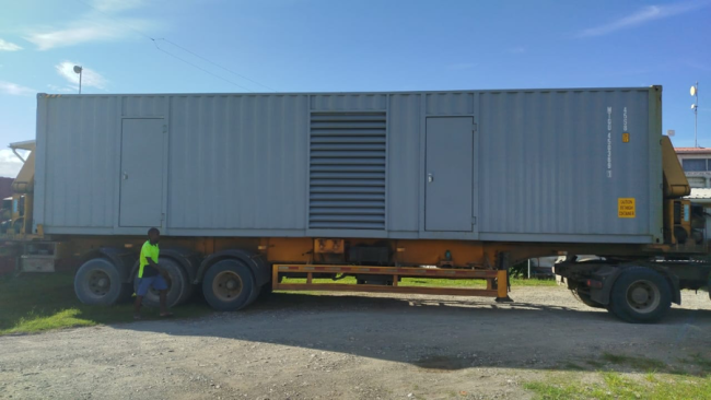 Container containing generator and accesories transported to Henderson