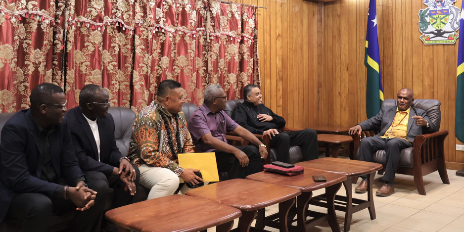 Evangelist Heward-Mills (closest to PM) and his team meeting Prime Minister Hon. Jeremiah Manele MP.