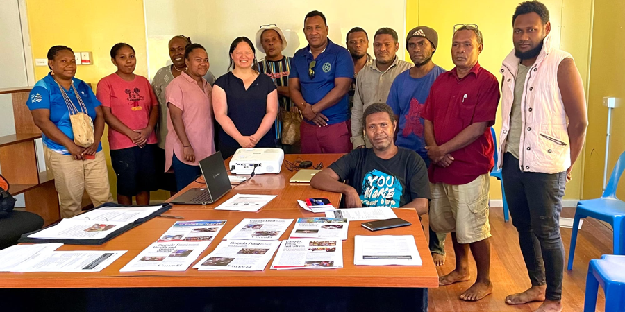 Participants of the information workshop pose with facilitators for a group photo after the session. Photo supplied