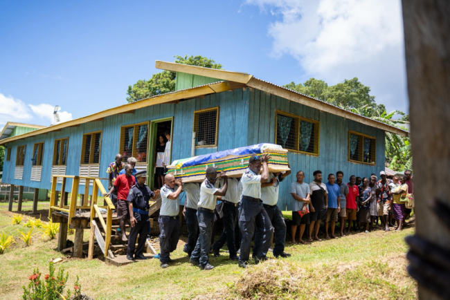 The casket  of the late Sir Francis carried to the burial site at Koriovuku village