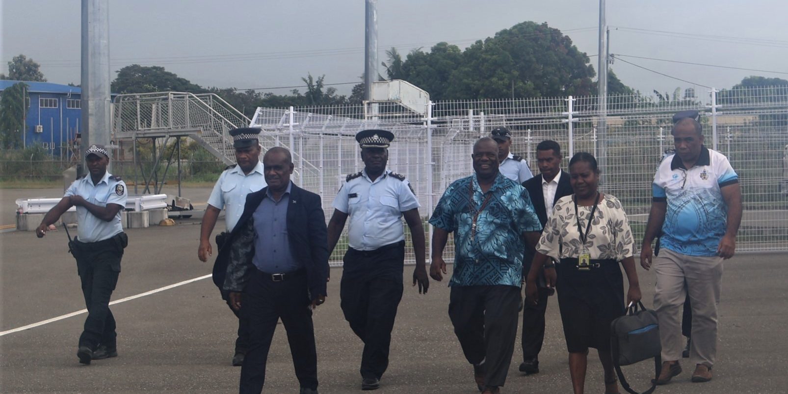 Deputy PM Hon. Tovosia MP escorting PM Manele MP for departure.
