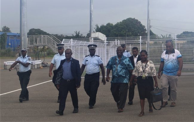 Deputy PM Hon. Tovosia MP escorting PM Manele MP for departure.