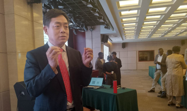 Dr Wang Yiwei during an interview