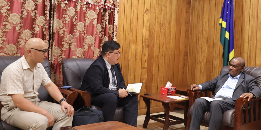 Prime Minister Hon. Manele MP and SINOMACH Executive Tony Xu and Deputy General Manager Vincent Luo