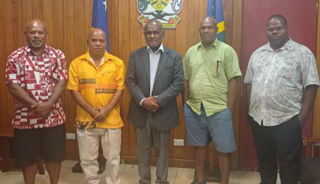 Prime Minister, Honorable Jeremiah Manele, MP, and Premier of Temotu, Honorable Stanley Tehi, MPA, (in yellow shirt) and executive members of Temotu Provincial Government