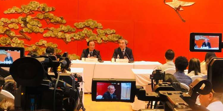 Prof Yifu Lin (right) speaking at the press briefing