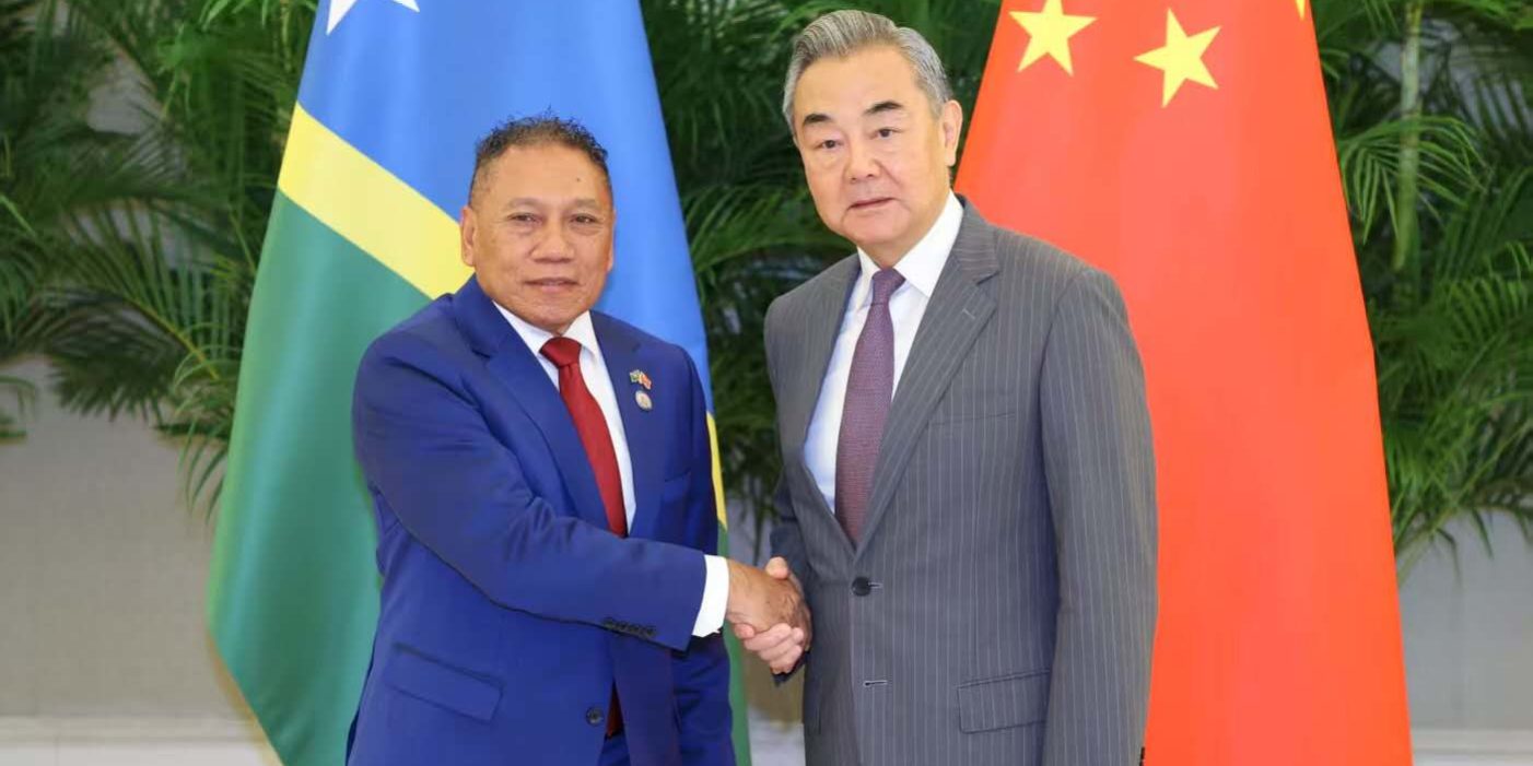 Foreign Minister Peter Shanel Agovaka and Chinese Foreign Minister Wang Yi