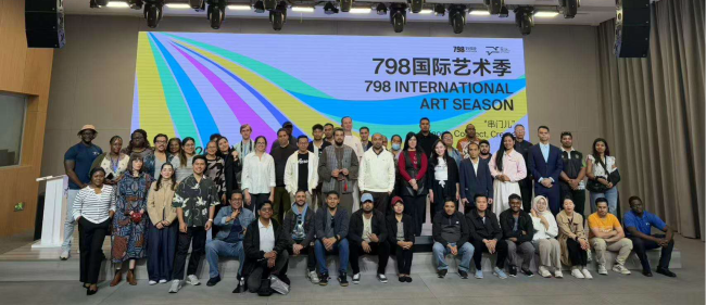 International journos pose for a group photo at the 798 Art Hub