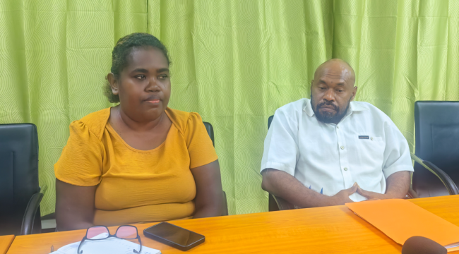 New Mines Minister, right, and Mines Official