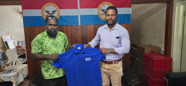 SICCI CEO, right, makes a presentation to the Malaita Premier