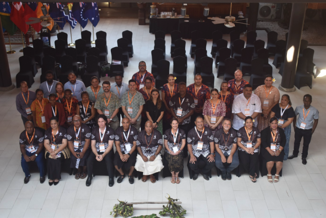 Trade officials pose for a group photo