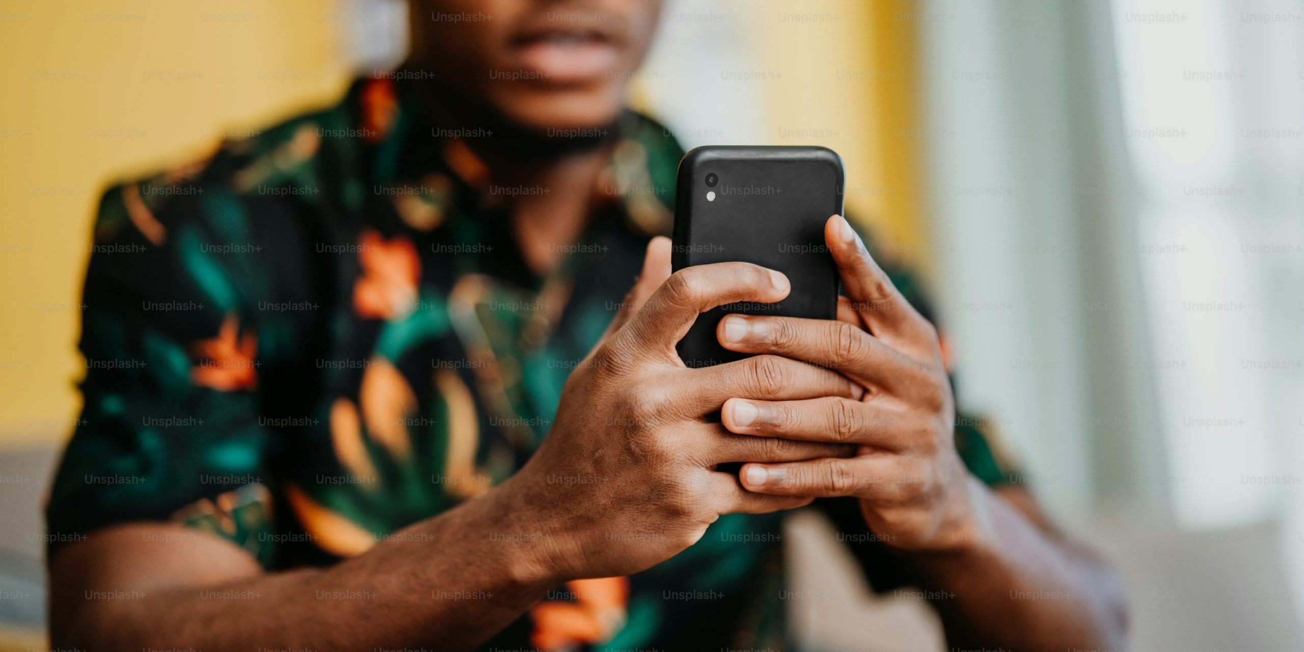 An internet user holding his smart phone