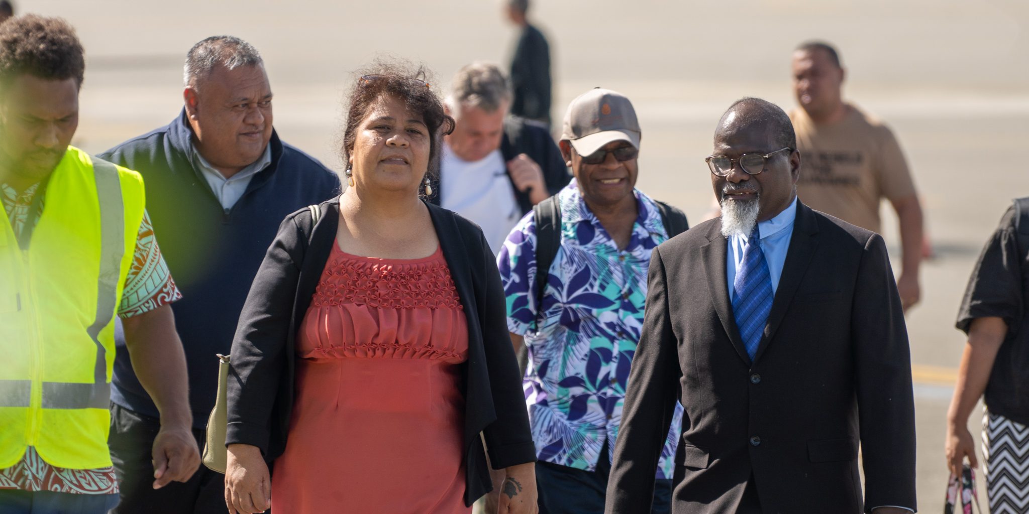 Judge Ronald Bei Talasasa escorting a guest. Photo FFA