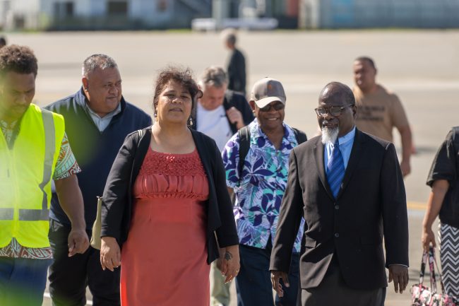 Judge Ronald Bei Talasasa escorting a guest. Photo FFA