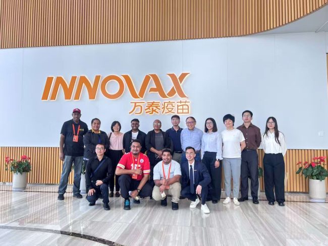 Pacific journos with Innovax Biotech Company officials during their visit to the Xiamen Innovax Biotech Company on Friday 30 May.